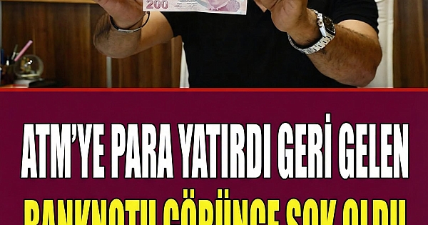 bir market işletmecisi, bankaya para yatırırken 